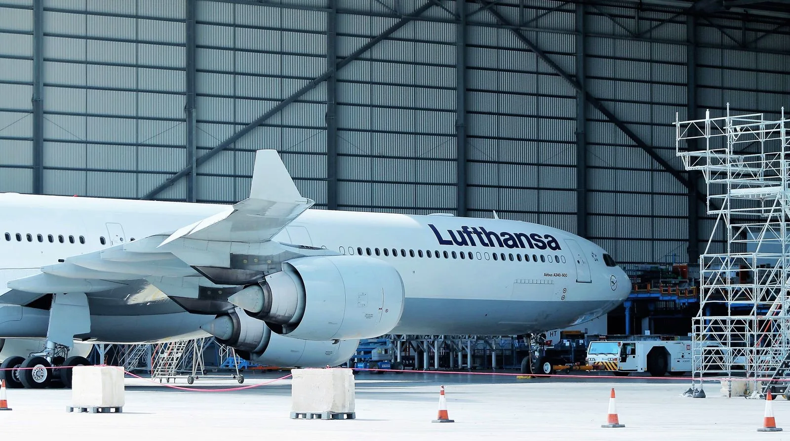 Commercial aircraft in a maintenance hangar
