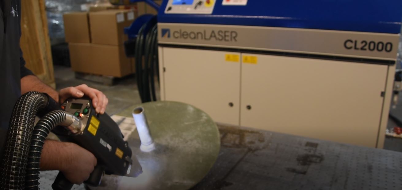 laser operator ablates with the OSH 80 optic using the CL2000 laser cleaning system