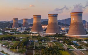 nuclear power plant with a beautiful sunset background 